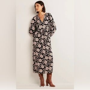 Notch neck tiered maxi dress.